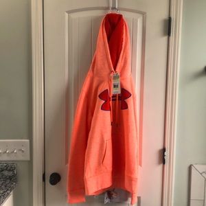 Womens under armour orange hoodie. Tags still on it and never worn. Size medium.